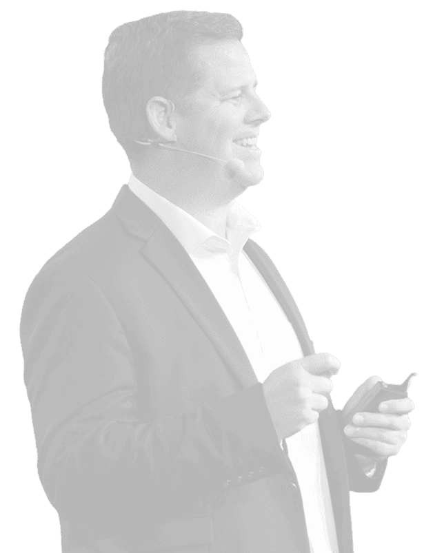 Side view of Jason smiling while speaking with black transparent overlay