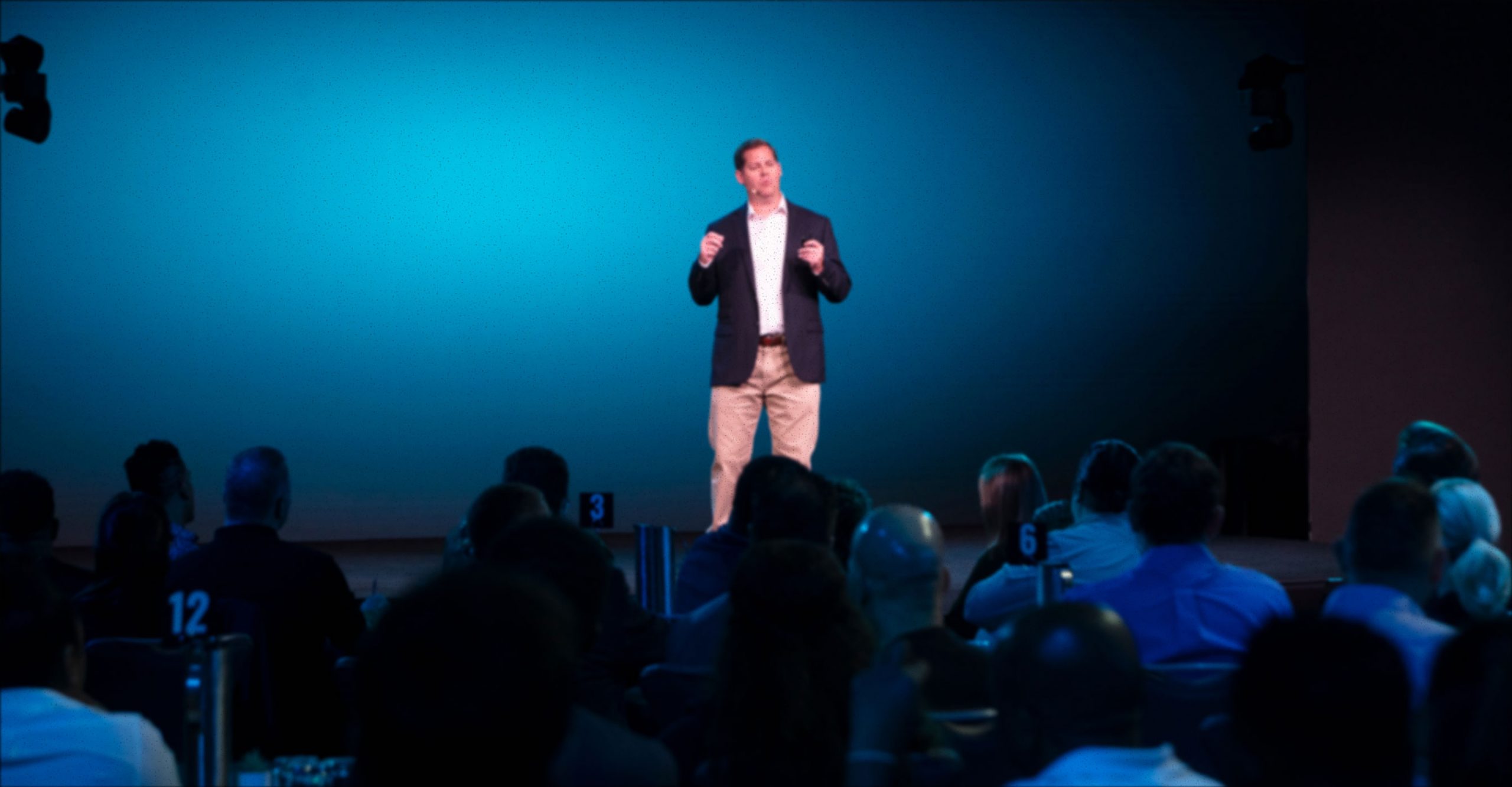 Jason speaking in front of people