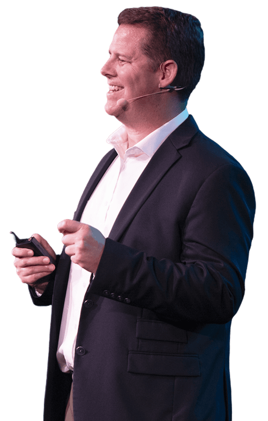 Side view of Jason smiling while speaking