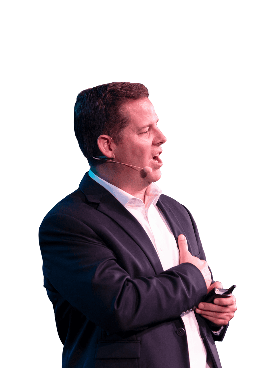 Side view of Jason smiling while speaking